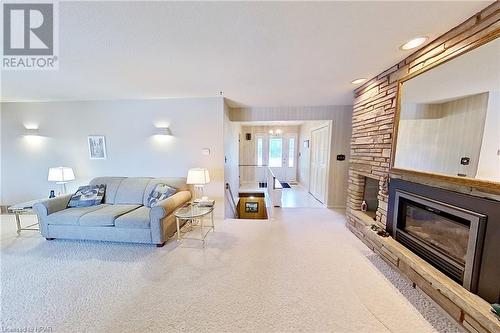 141 Charles Street, Wingham, ON - Indoor Photo Showing Living Room With Fireplace