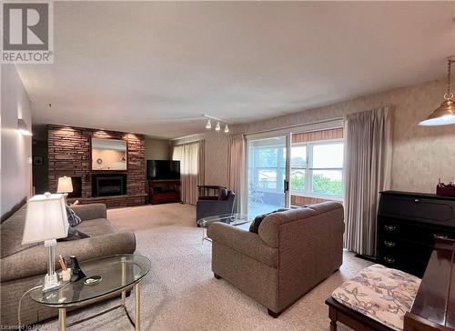 141 Charles Street, Wingham, ON - Indoor Photo Showing Living Room With Fireplace