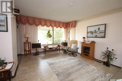 241 31St Street W, Battleford, SK - Indoor Photo Showing Other Room With Fireplace