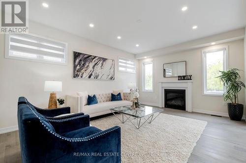 1535 Wellwood Terrace, Milton (Cobban), ON - Indoor Photo Showing Living Room With Fireplace