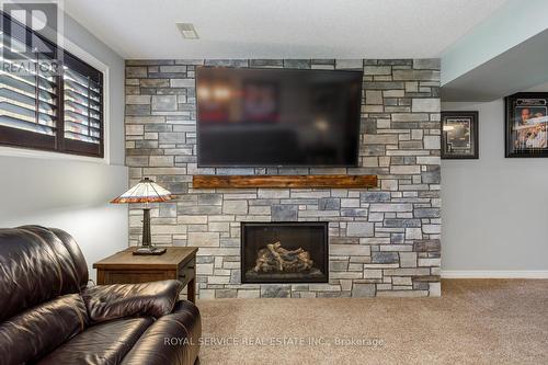 419 Spillsbury Drive, Peterborough (Otonabee), ON - Indoor Photo Showing Living Room With Fireplace