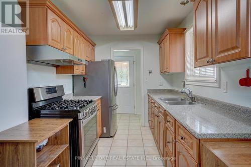 7655 Anaka Drive, Mississauga (Malton), ON - Indoor Photo Showing Kitchen With Double Sink