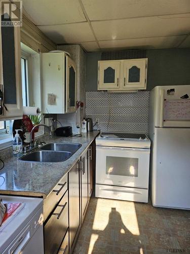 26 Sixth Ave, Englehart, ON - Indoor Photo Showing Kitchen With Double Sink