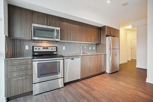 55 Speers Road|Unit #212, Oakville, ON - Indoor Photo Showing Kitchen