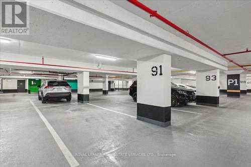 1112 - 2489 Taunton Road, Oakville (Uptown Core), ON - Indoor Photo Showing Garage