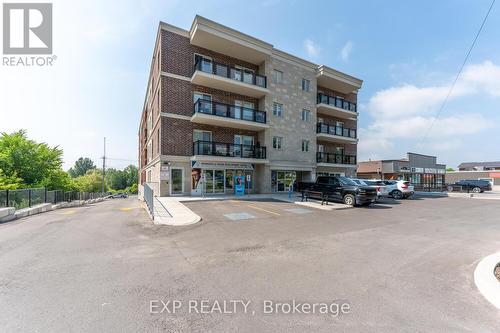 202 - 310 Broadway Avenue, Orangeville, ON - Outdoor With Facade