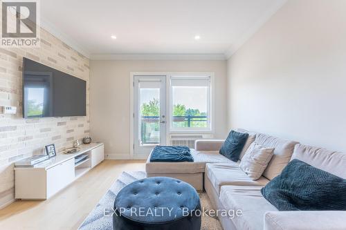 202 - 310 Broadway Avenue, Orangeville, ON - Indoor Photo Showing Living Room