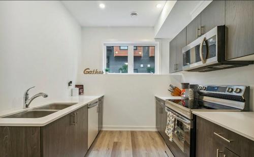 781 Claire Avenue|Unit #313, Welland, ON - Indoor Photo Showing Kitchen With Double Sink