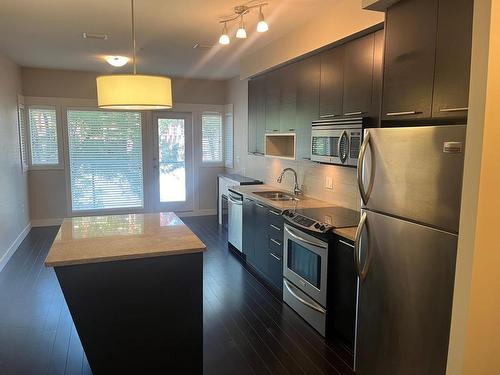 1205-1000 Talasa Way, Kamloops, BC - Indoor Photo Showing Kitchen With Stainless Steel Kitchen