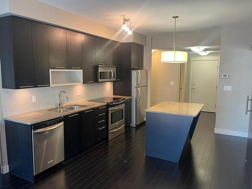 1205-1000 Talasa Way, Kamloops, BC - Indoor Photo Showing Kitchen With Stainless Steel Kitchen With Double Sink With Upgraded Kitchen