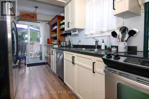 1 - 2322 Marine Drive, Oakville (Bronte West), ON - Indoor Photo Showing Kitchen With Double Sink