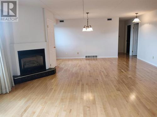 605 145 Fanshaw Street, Thunder Bay, ON - Indoor Photo Showing Living Room With Fireplace