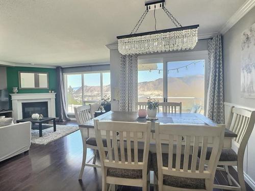 1-2526 Nechako Drive, Kamloops, BC - Indoor Photo Showing Dining Room With Fireplace