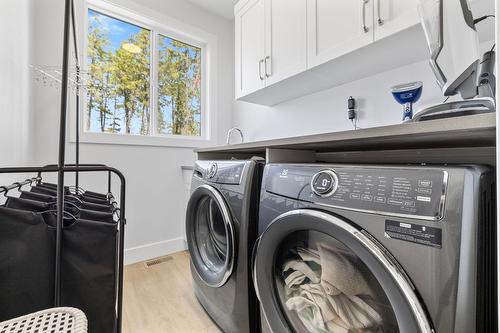 1888 Northern Flicker Court, Kelowna, BC - Indoor Photo Showing Laundry Room