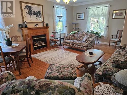 601 Valhalla Road, Nelson, BC - Indoor Photo Showing Living Room With Fireplace