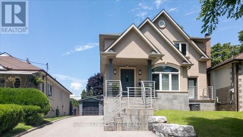 30 Doddington Drive, Toronto (Stonegate-Queensway), ON - Outdoor With Facade