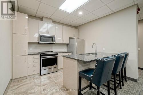 728 - 2490 Old Bronte Road, Oakville (Palermo West), ON - Indoor Photo Showing Kitchen With Stainless Steel Kitchen