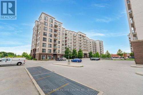 728 - 2490 Old Bronte Road, Oakville (Palermo West), ON - Outdoor With Facade