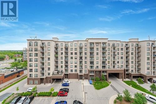 728 - 2490 Old Bronte Road, Oakville (Palermo West), ON - Outdoor With Balcony With Facade