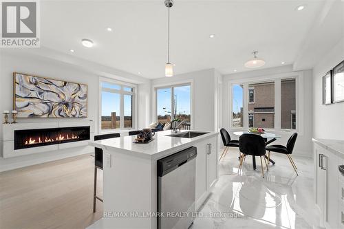 77 Schmeltzer Crescent, Richmond Hill, ON - Indoor Photo Showing Kitchen With Fireplace