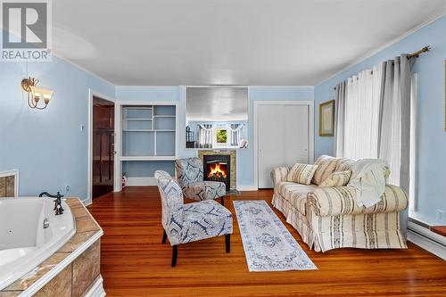 152 Water Street, Carbonear, NL - Indoor Photo Showing Living Room With Fireplace