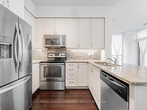 520-1185 The Queensway, Toronto, ON - Indoor Photo Showing Kitchen With Double Sink With Upgraded Kitchen