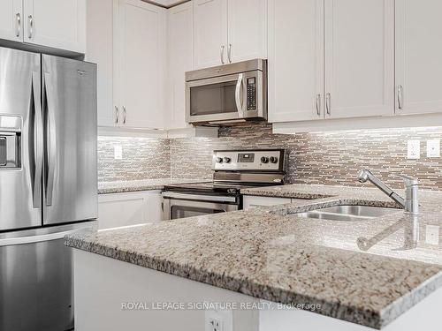 520-1185 The Queensway, Toronto, ON - Indoor Photo Showing Kitchen With Double Sink With Upgraded Kitchen