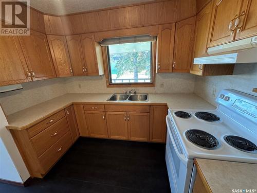 668 2Nd Avenue Ne, Preeceville, SK - Indoor Photo Showing Kitchen With Double Sink