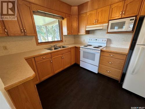 668 2Nd Avenue Ne, Preeceville, SK - Indoor Photo Showing Kitchen With Double Sink