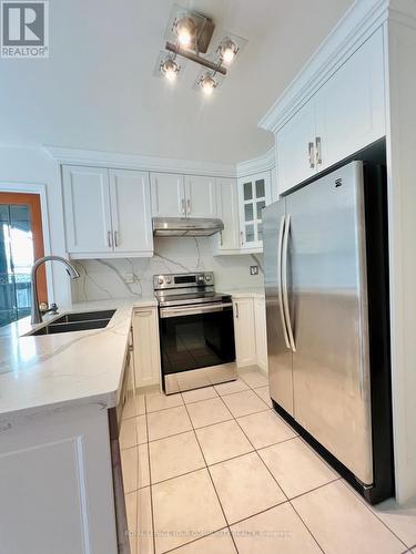 65 Dakin Drive, Ajax (Central West), ON - Indoor Photo Showing Kitchen With Double Sink