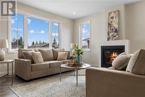 18 Morrison Drive, Cobden, ON - Indoor Photo Showing Living Room With Fireplace