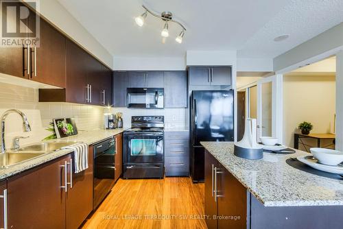 1451 - 25 Viking Lane, Toronto (Islington-City Centre West), ON - Indoor Photo Showing Kitchen With Double Sink