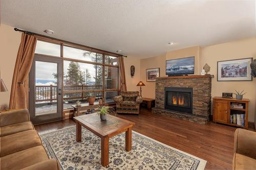 23 - 1301 Gerry Sorensen Way, Kimberley, BC - Indoor Photo Showing Living Room With Fireplace