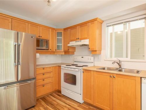 207-5660 Edgewater Lane, Nanaimo, BC - Indoor Photo Showing Kitchen With Double Sink