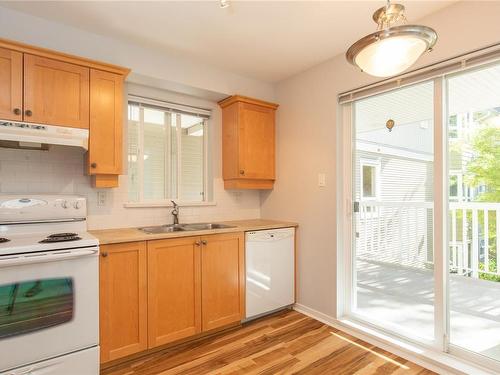 207-5660 Edgewater Lane, Nanaimo, BC - Indoor Photo Showing Kitchen With Double Sink