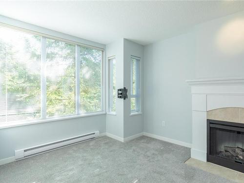 207-5660 Edgewater Lane, Nanaimo, BC - Indoor With Fireplace