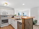 3210-27 Island Hwy South, Campbell River, BC  - Indoor Photo Showing Kitchen With Double Sink 