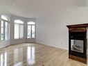 Salon - 7650 Rue Laffite, Brossard, QC  - Indoor Photo Showing Other Room With Fireplace 