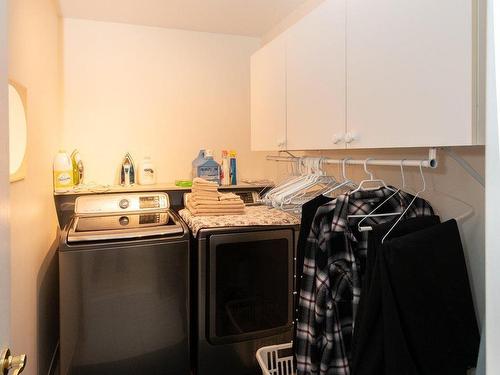 Salle de lavage - 116 Ch. Des Topazes, Saint-Sauveur, QC - Indoor Photo Showing Laundry Room