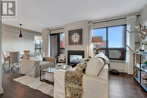 510 - 181 James Street N, Hamilton (Strathcona), ON - Indoor Photo Showing Living Room With Fireplace