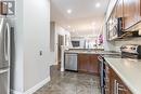 10 - 5080 Fairview Street, Burlington (Appleby), ON  - Indoor Photo Showing Kitchen With Double Sink With Upgraded Kitchen 