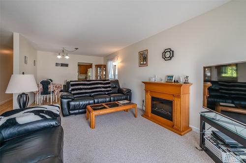 44 Bayview Crescent, Osoyoos, BC - Indoor Photo Showing Living Room With Fireplace