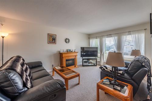 44 Bayview Crescent, Osoyoos, BC - Indoor Photo Showing Living Room With Fireplace