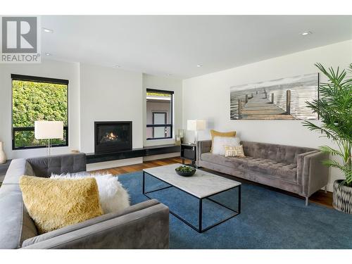 486 Carona Crescent, Kelowna, BC - Indoor Photo Showing Living Room With Fireplace