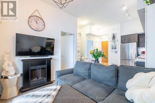 2014 - 30 Shore Breeze Drive, Toronto (Mimico), ON - Indoor Photo Showing Living Room With Fireplace