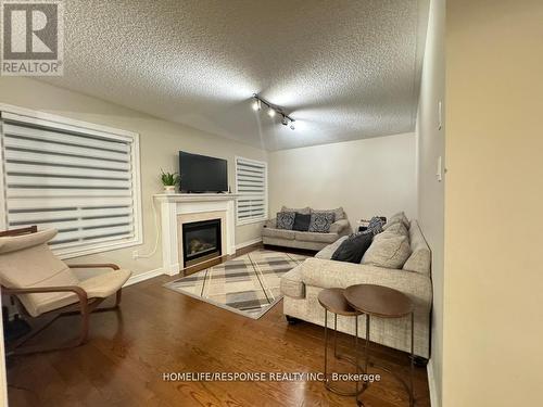 3254 Mcdowell Drive, Mississauga (Churchill Meadows), ON - Indoor Photo Showing Living Room With Fireplace