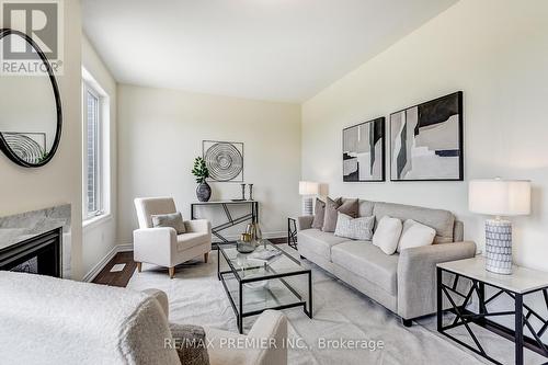 67 Armilia Place, Whitby, ON - Indoor Photo Showing Living Room With Fireplace