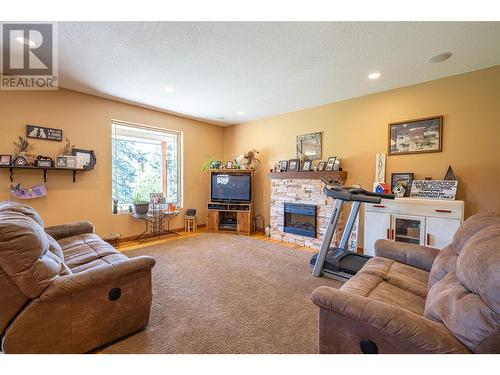 242 Commonage Road, Vernon, BC - Indoor Photo Showing Living Room With Fireplace