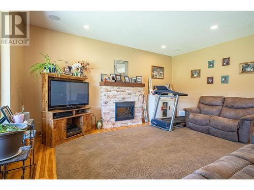 242 Commonage Road, Vernon, BC - Indoor Photo Showing Living Room With Fireplace