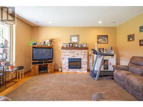 242 Commonage Road, Vernon, BC - Indoor Photo Showing Living Room With Fireplace